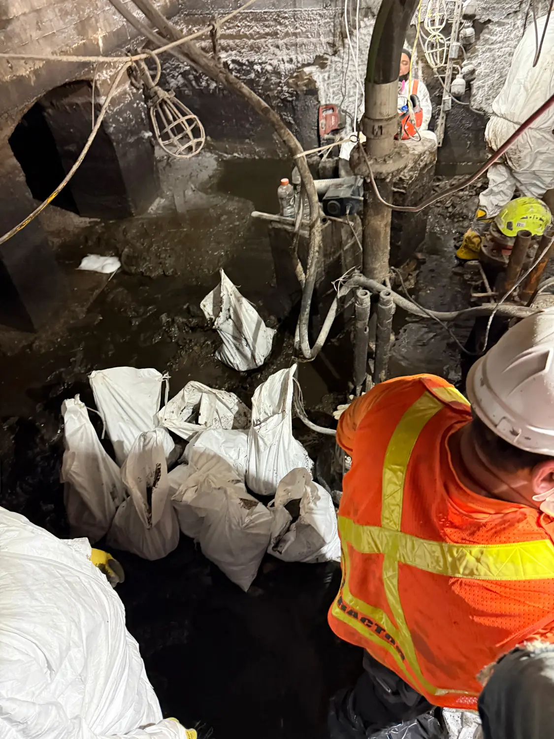 Crew working under active site safety management coverage